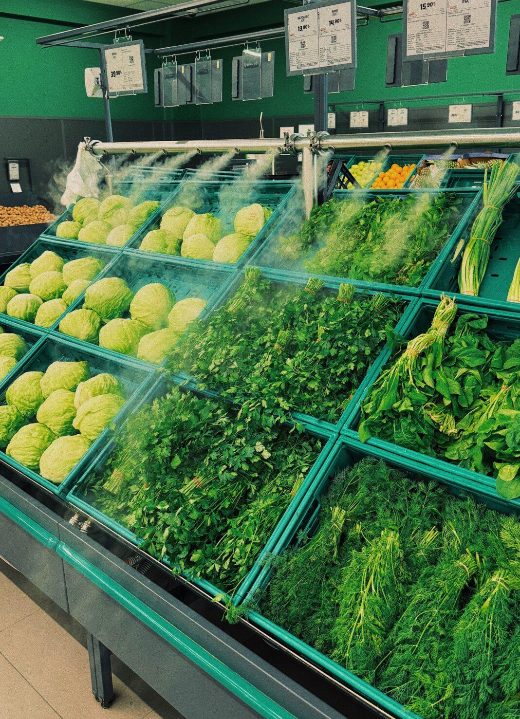 Vibrant array of fresh cabbages and greens in a supermarket in Isparta, Türkiye.