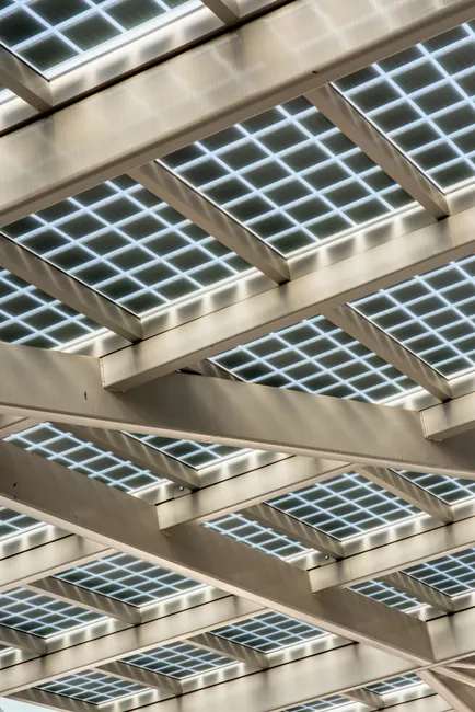 Abstract view of a modern solar panel structure with geometric patterns.